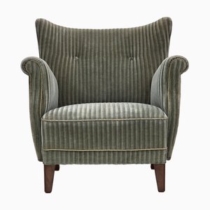 Butaca danesa de muebles de terciopelo verde y patas de madera de roble, años 60