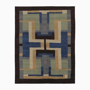 Alfombra en azul y gris con estampado geométrico de Rug & Kilim