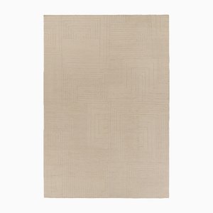 Alfombra con textura en tonos beige y crema de Rug & Kilim