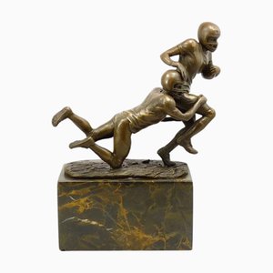 Bronze Statue of Football Player