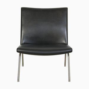 Silla AP-40 de cuero negro de Hans Wegner, años 80