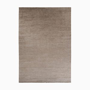 Alfombra con textura en blanco y beige de Rug & Kilim