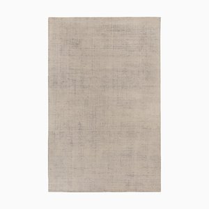 Alfombra con textura en tonos beige y marrón de Rug & Kilim