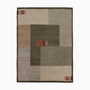 Alfombra en beige y gris con estampado geométrico de Rug & Kilim
