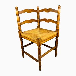 Vintage Eckstuhl aus Holz mit Sitz aus geflochtenem Stroh, 1950er