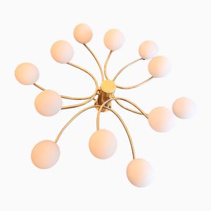 Large Vintage Curved Brass Frame Chandelier with 12 Milk Glass Globes from Helestra