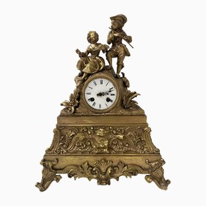Romantische Uhr aus Vergoldeter Bronze, 19. Jh.