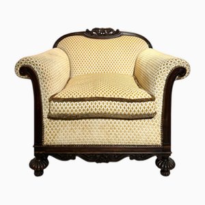 Lounge Chair in Carved Mahogany