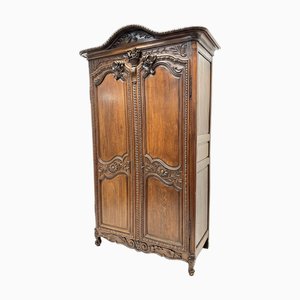 Antiker französischer Schrank im Louis XV Stil aus geschnitzter Eiche