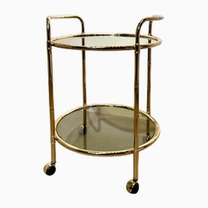 Carrello bar vintage in ottone e vetro fumé