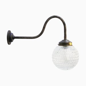 Mid-Century Modern Cast Iron Wall Light in Brass and Clear Glass
