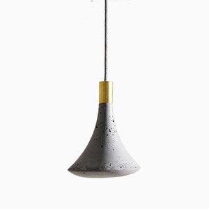 Lampada Blump in cemento di Adam Molnar per MOHA design