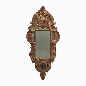 Espejo Rocaille antiguo de madera dorada, siglo XVIII