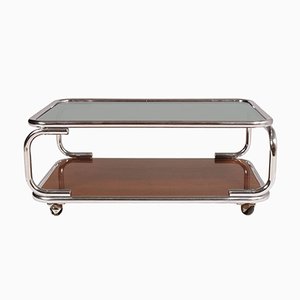 Italienischer Couchtisch aus Chrom, Rauchglas & laminiertem Holzimitat auf Rollen, 1960er