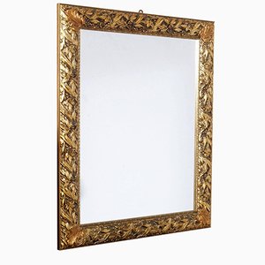 Espejo artesanal florentino vintage con marco dorado tallado