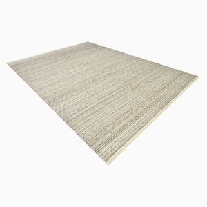 Kelim Teppich aus Wolle mit Pompon