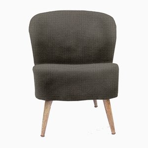 Personalisierbarer Vintage Sessel mit abgerundeter Rückenlehne