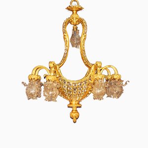 Lampadario in bronzo dorato e cristallo, XIX secolo