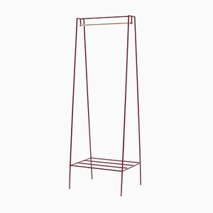 A Clothes Rail in Beetroot with a Brass Pole by &New