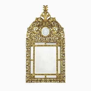 Espejo antiguo dorado de madera tallada