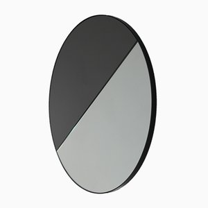 Mixed Tint Dualis Orbis Round Mirror with Black Frame by Alguacil & Perkoff Ltd, 2019