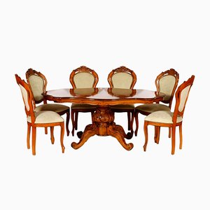 Tavolo da pranzo in legno di noce intagliato a mano in stile barocco con sedie, anni '30, set di 7