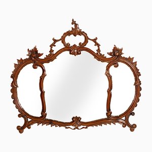 Specchio da parete antico in legno di noce intagliato di Testolini & Salviati