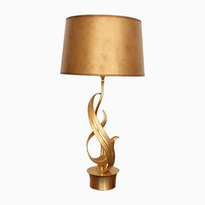 Lámpara de mesa en forma de llama de bronce chapado en oro de Lumi Milano