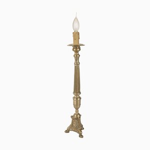 Lámpara antigua en forma de candelabro de bronce dorado, década del 1600