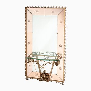 Espejo biselado grande con marco de hierro forjado y consola de vidrio, años 30