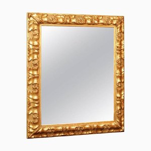 Specchio Napoleone III in legno e stucco dorato