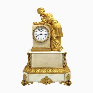 Reloj de péndulo francés Louis Philippe de bronce dorado y mármol, siglo XIX