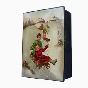 Dekorativer Kiste mit Schlittenmotiv, 1930er