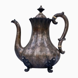Tetera antigua de plata