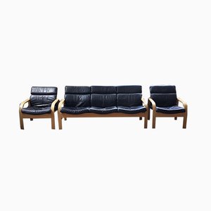 Sofá y sillas de cuero negro y madera curvada, años 60. Juego de 3