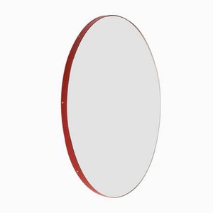 Medium Round Silver Tinted Orbis Mirror with Red Frame by Alguacil & Perkoff