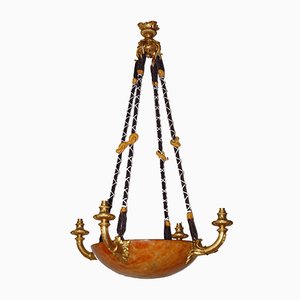 Lámpara de araña antigua de bronce dorado y alabastro
