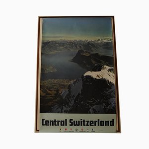 Litografia pubblicitaria Anytime Holiday Time Travel della Svizzera centrale, anni '70