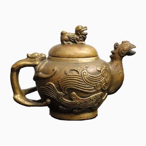 Tetera china antigua de bronce