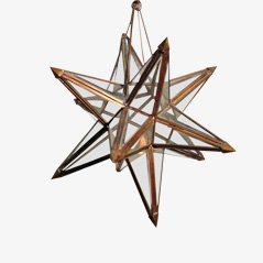 Estrella decorativa de latón macizo y vidrio