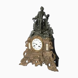 Reloj francés La Fontaine de latón, década de 1900