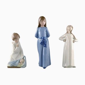 Figure in porcellana di Nao e Lladro, set di 3