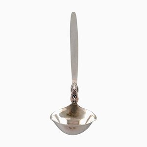 Sartén Georg Jensen Cactus de plata esterlina con mantequilla