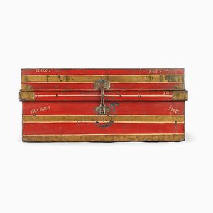 Baúl de viaje de metal rojo, años 40