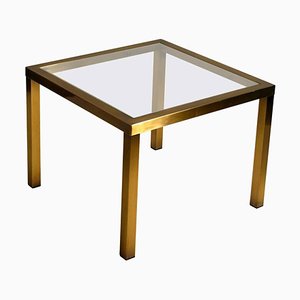 Mesa de centro minimalista cuadrada de latón con tablero de vidrio transparente de Belgo Chrome, años 70