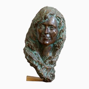 Busto femenino de bronce, años 70