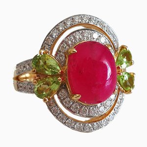 Ring aus 18 Kt. Gelbgold mit Rotem Bergkristall, Diamanten & Peridot