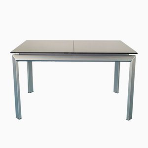 Mesa de comedor extensible de aluminio y vidrio negro templado, años 90