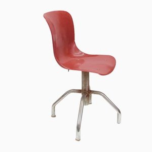 Silla de oficina con asiento ergonómico de plástico rojo ladrillo, años 50