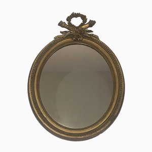 Espejo francés Louis XVI de madera y oro, siglo XIX